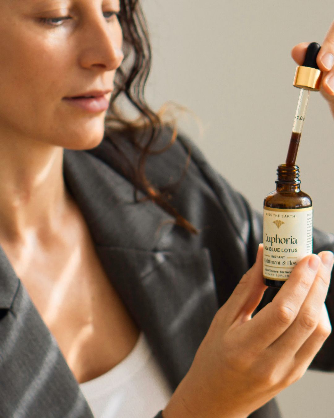Euphoria Blue Lotus tincture bottle – natural mood and sleep and mood support