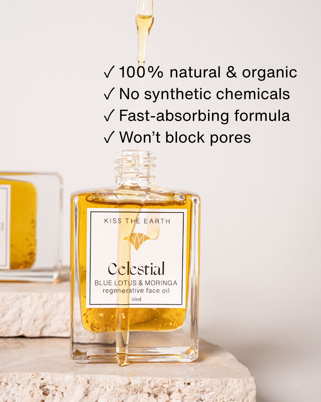 Celestial skincare blend with sea buckthorn, moringa, and black seed oil. Dripping oil in the bottle