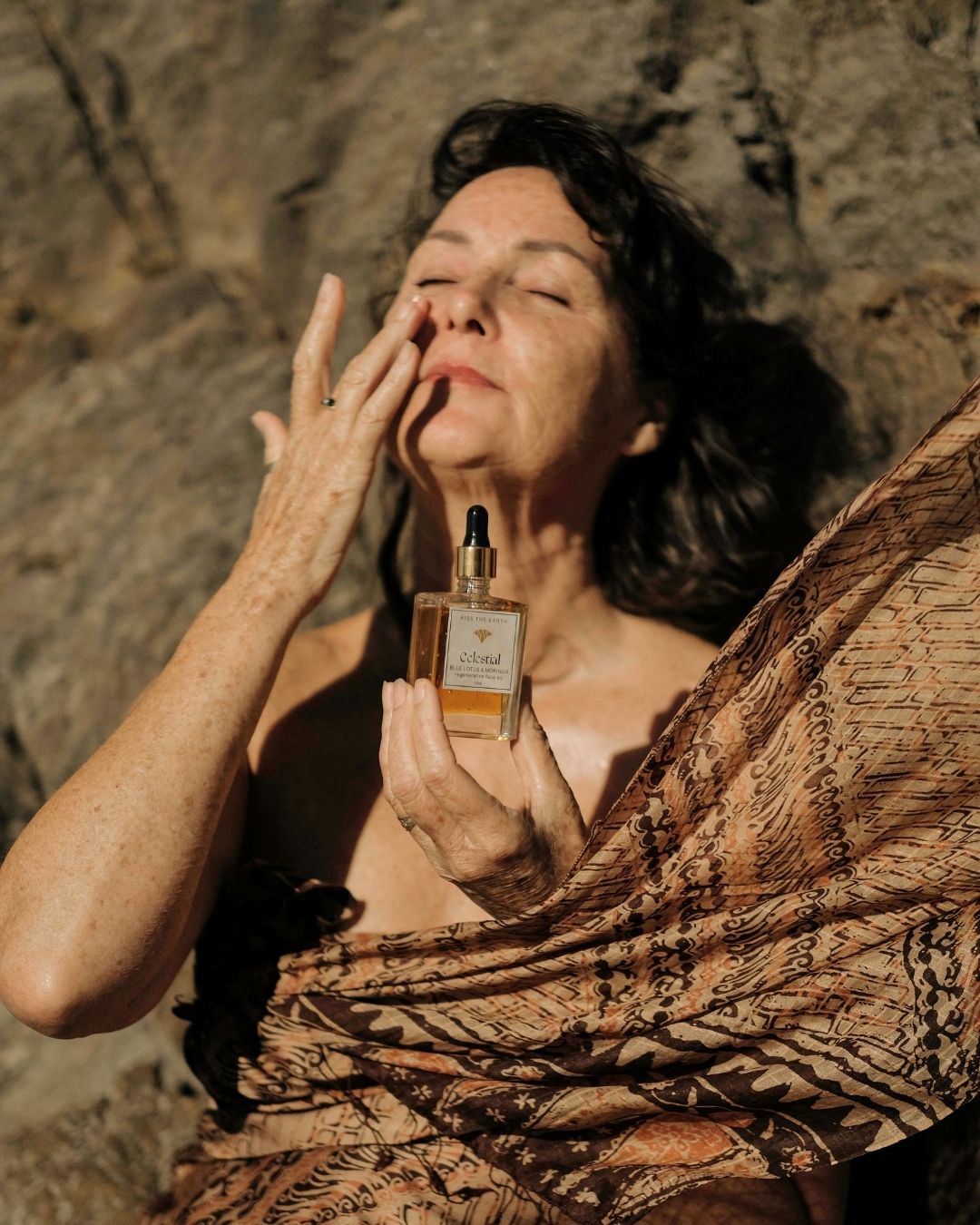 Mature women using calming face oil for rosacea, made in new zealand