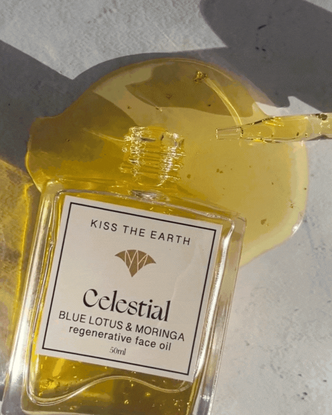 Woman using celestial natural glowing face oil to reduce retinol 