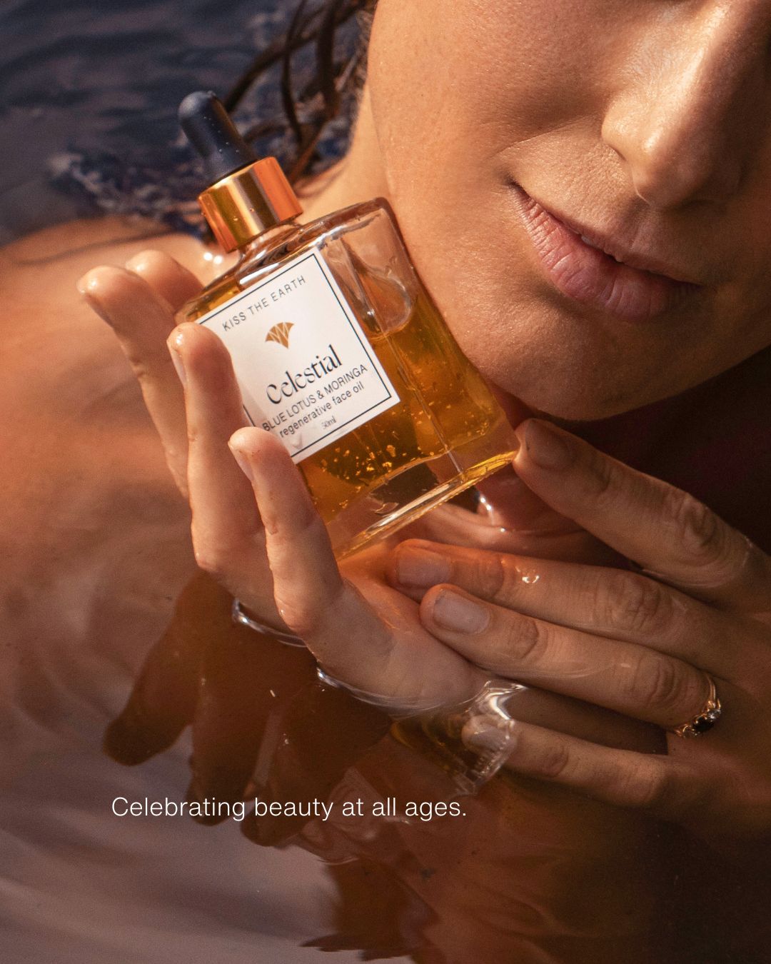 Women with glowing skin holding natural face oil