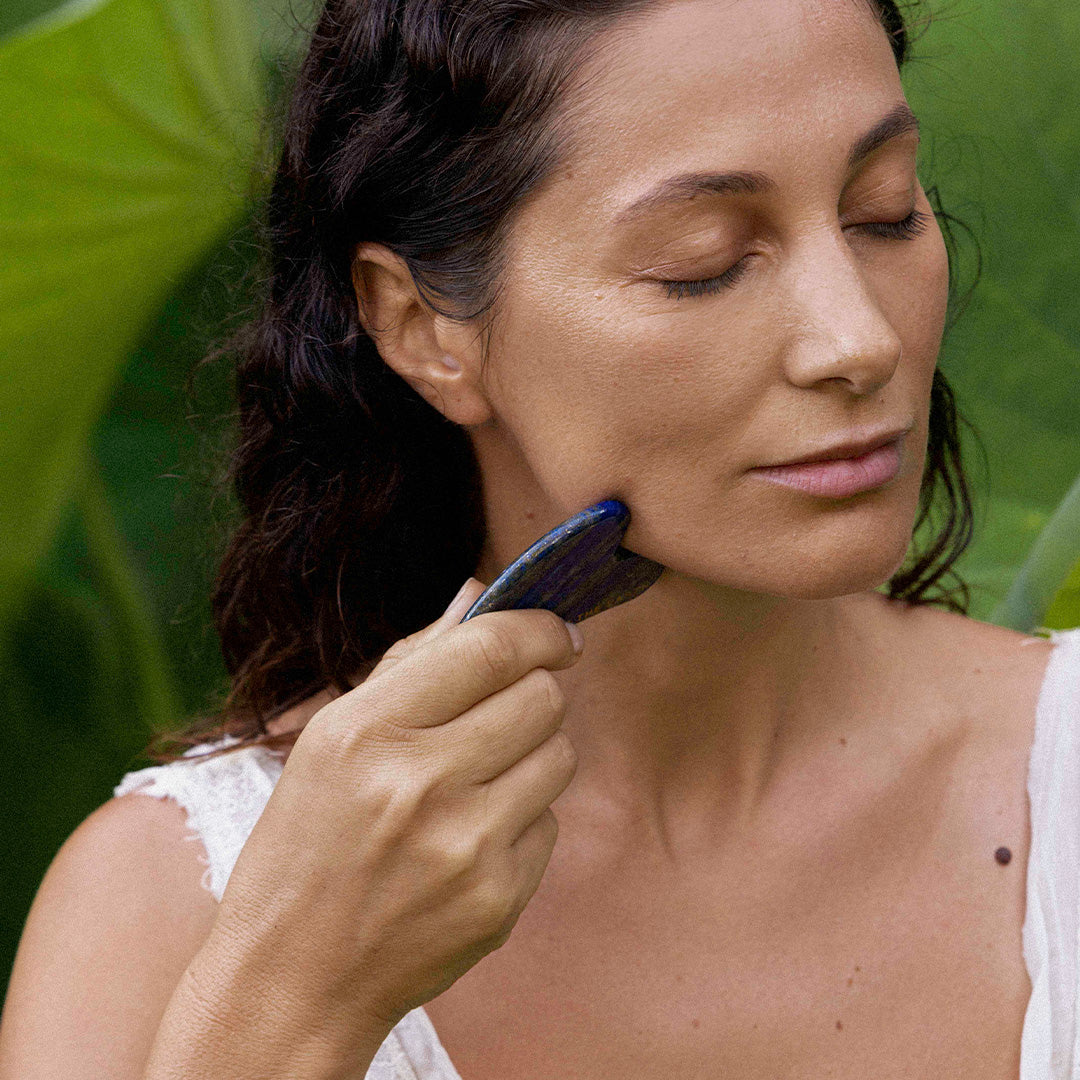 GUA sha ritual for skin relaxation, promote blood flow and collagen production